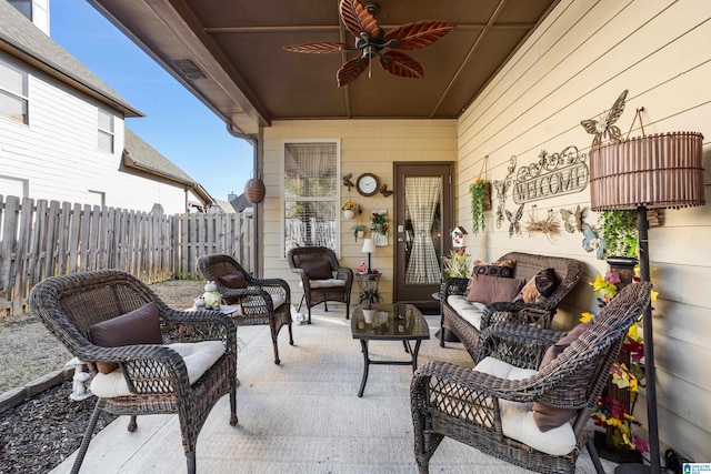 view of patio featuring ceiling fan and an outdoor living space