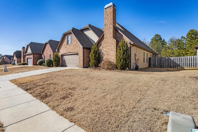 view of side of home with a garage