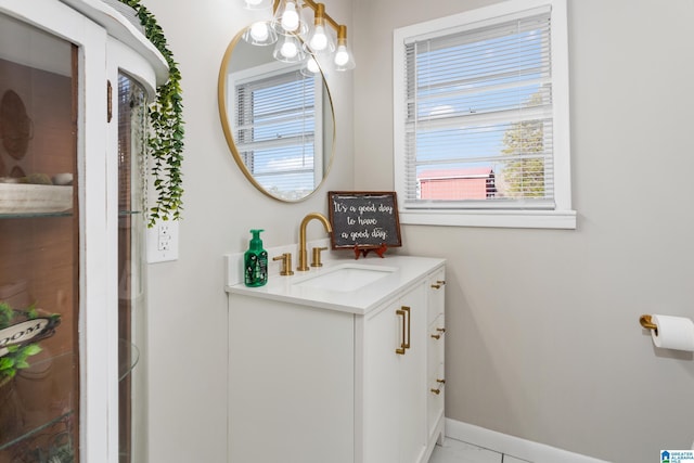 bathroom with vanity and plenty of natural light