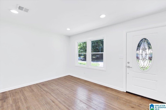 foyer with light wood-type flooring