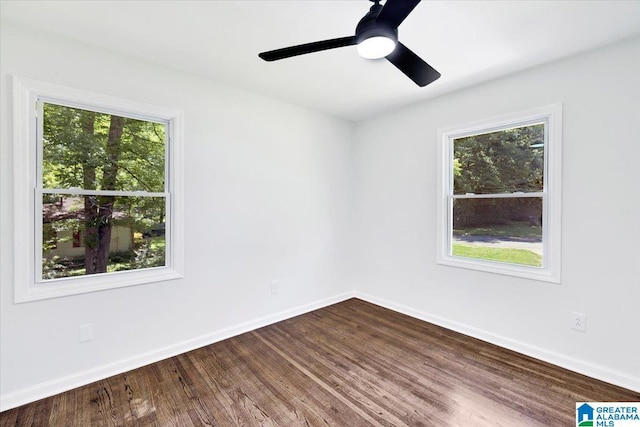 spare room featuring ceiling fan and wood-type flooring