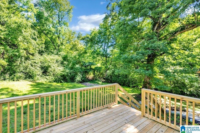 deck featuring a yard