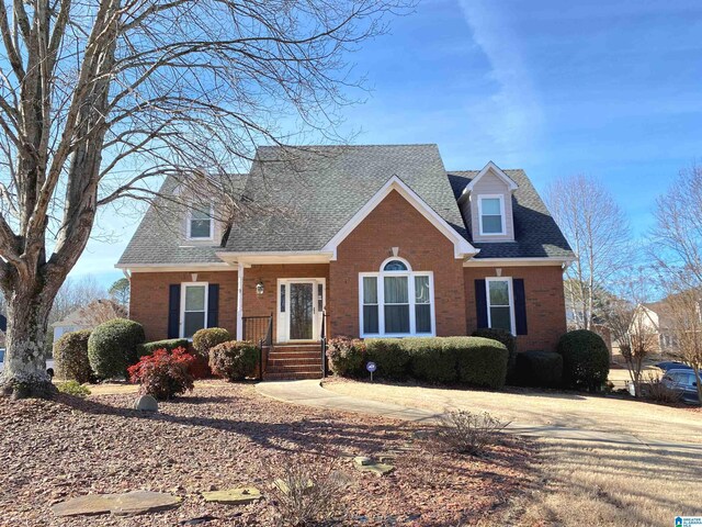 view of new england style home