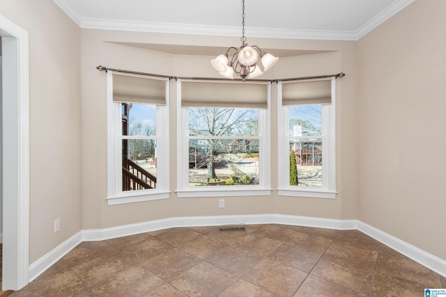 unfurnished dining area with an inviting chandelier and ornamental molding