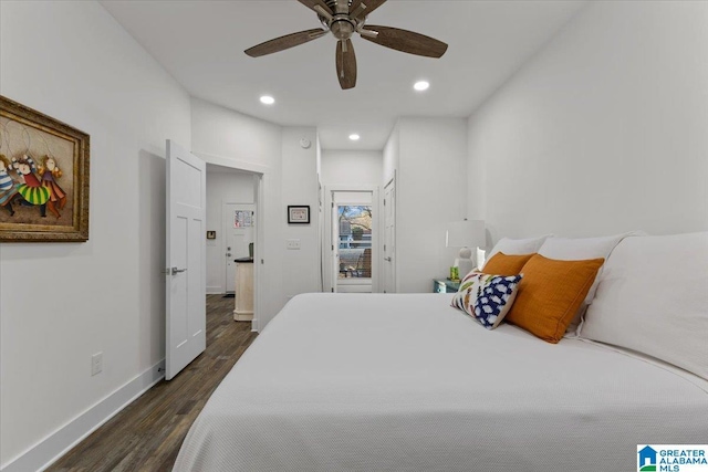 bedroom with ceiling fan and dark wood-type flooring