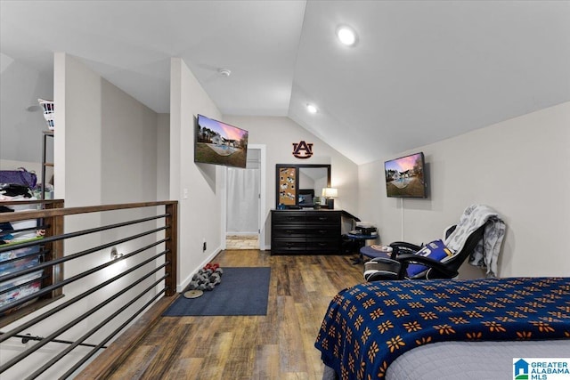 bedroom featuring lofted ceiling and dark wood-type flooring