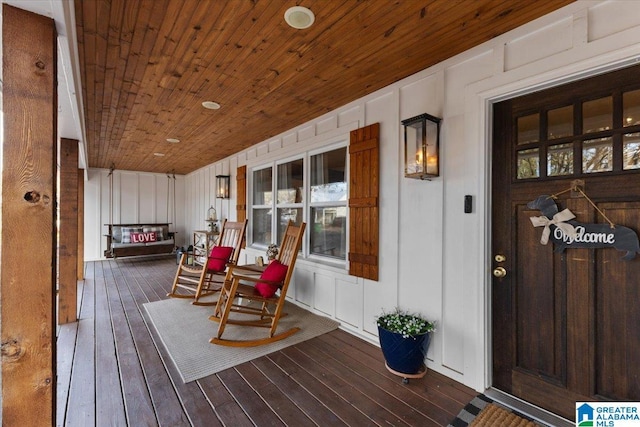 wooden deck with a porch