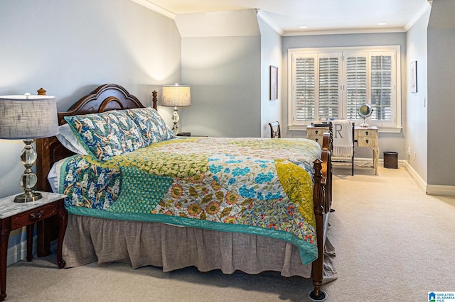 carpeted bedroom featuring ornamental molding