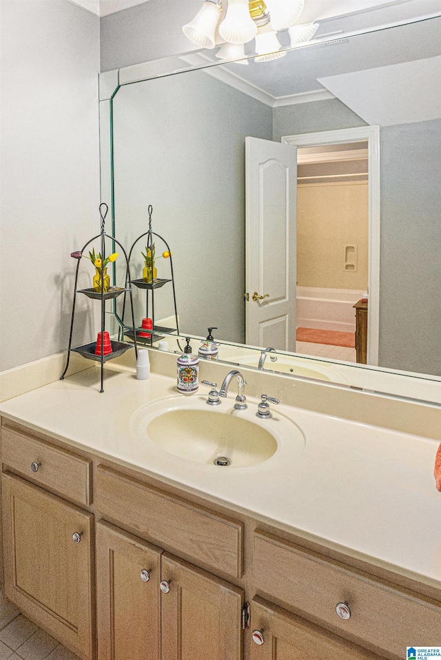 bathroom featuring vanity and crown molding