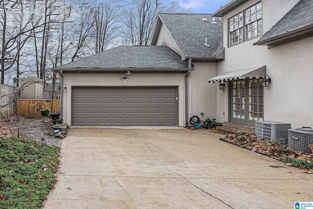 exterior space with french doors and central AC unit