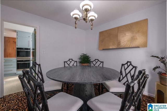 dining room with a notable chandelier