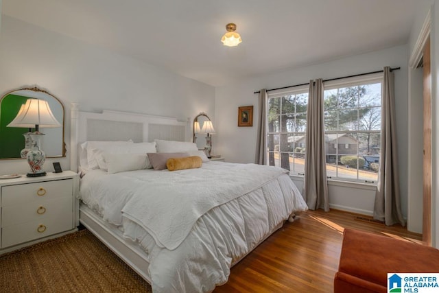 bedroom featuring hardwood / wood-style flooring