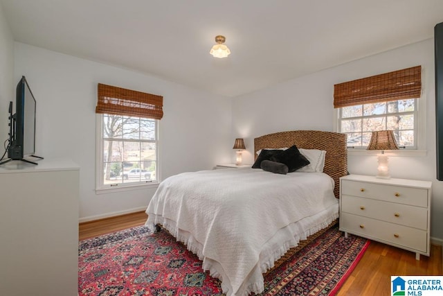 bedroom with light hardwood / wood-style floors