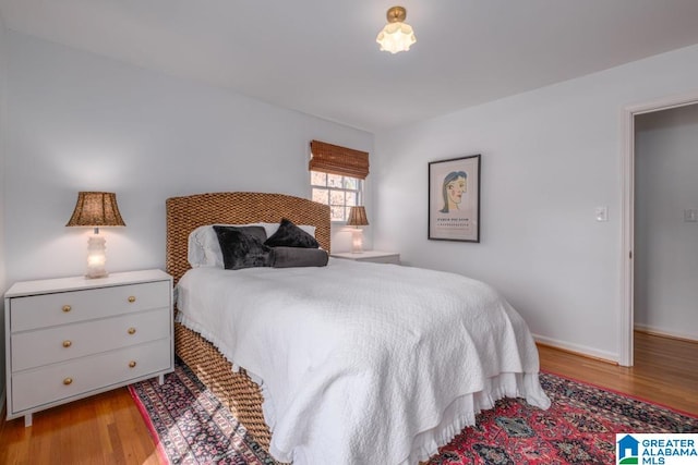 bedroom featuring light hardwood / wood-style floors