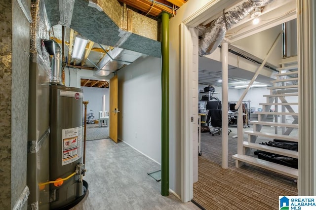 utility room featuring gas water heater