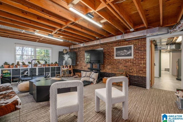 interior space featuring brick wall