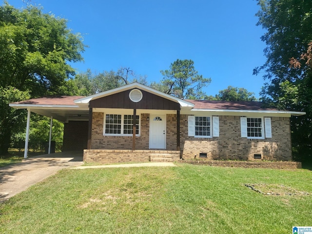 single story home with a carport and a front lawn