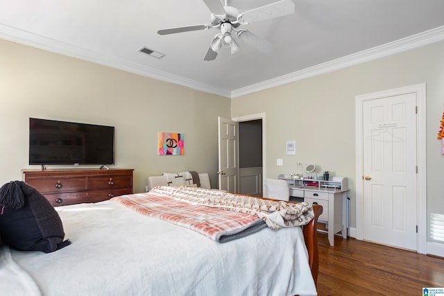 bedroom with dark wood-type flooring, ceiling fan, and crown molding