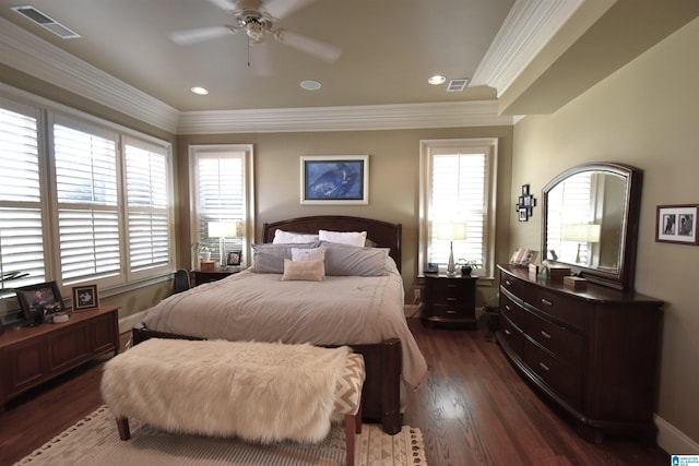 bedroom featuring ornamental molding, ceiling fan, and dark hardwood / wood-style floors