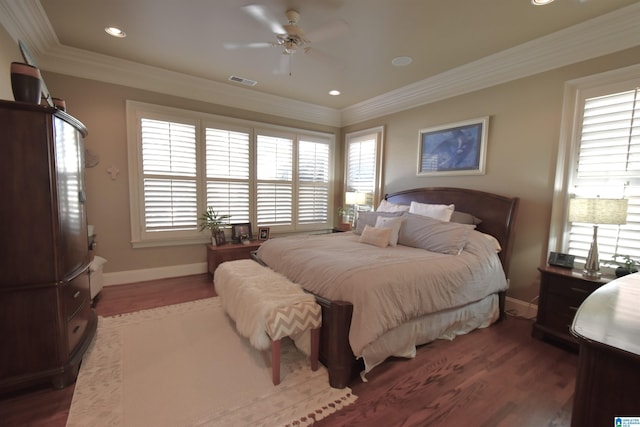 bedroom with dark wood-type flooring, ceiling fan, and crown molding