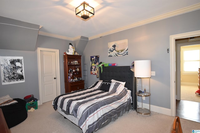 carpeted bedroom featuring ornamental molding