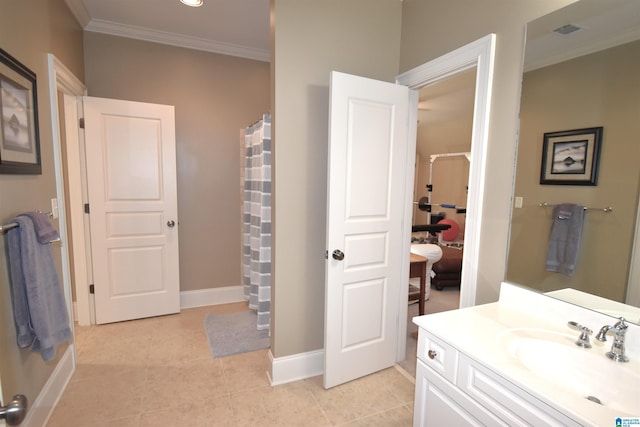 bathroom with ornamental molding, tile patterned flooring, and vanity