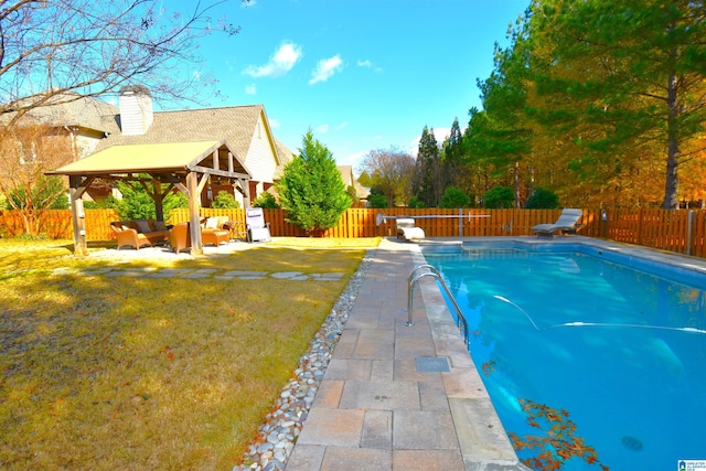 view of pool with a lawn, a gazebo, a diving board, and outdoor lounge area