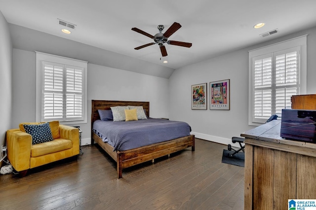 bedroom with lofted ceiling, ceiling fan, and dark hardwood / wood-style floors