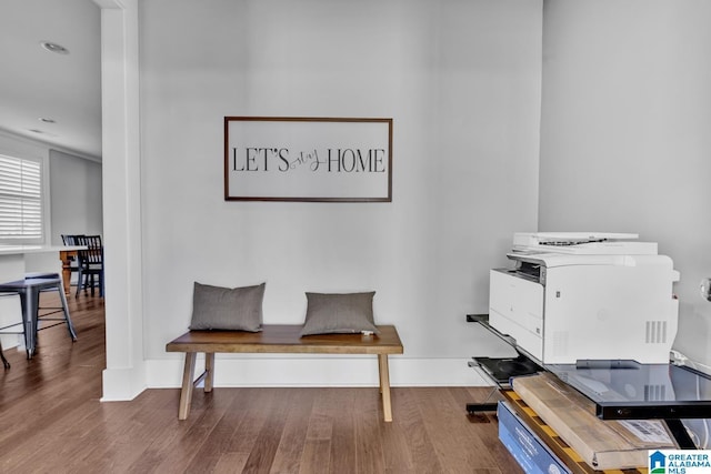 home office with wood-type flooring