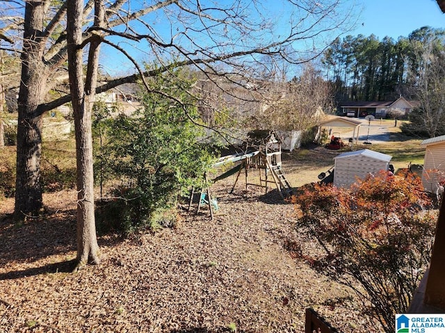 view of yard with a playground