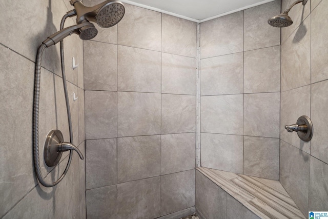 bathroom featuring tiled shower