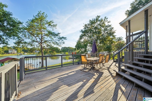 wooden terrace with a water view