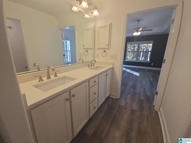 bathroom featuring ceiling fan, vanity, and hardwood / wood-style flooring