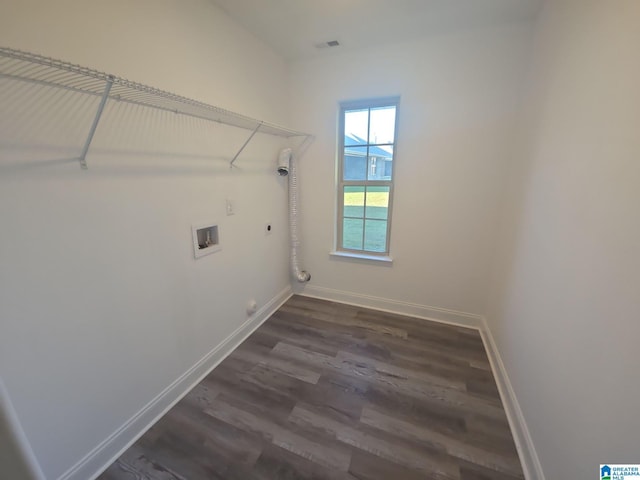 laundry area featuring electric dryer hookup, hookup for a washing machine, hookup for a gas dryer, and dark wood-type flooring