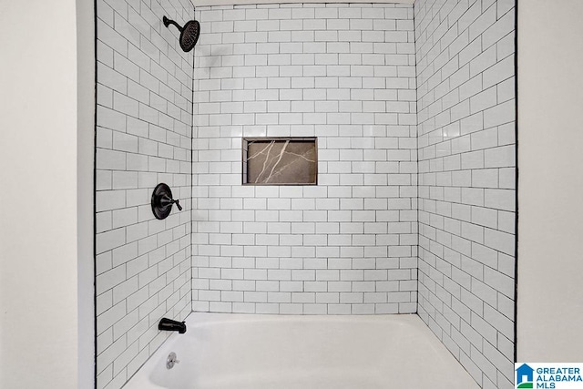 full bath featuring tub / shower combination