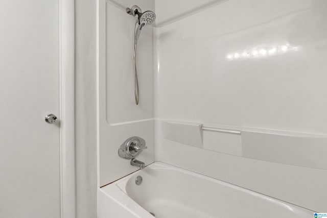 bathroom with shower / tub combination