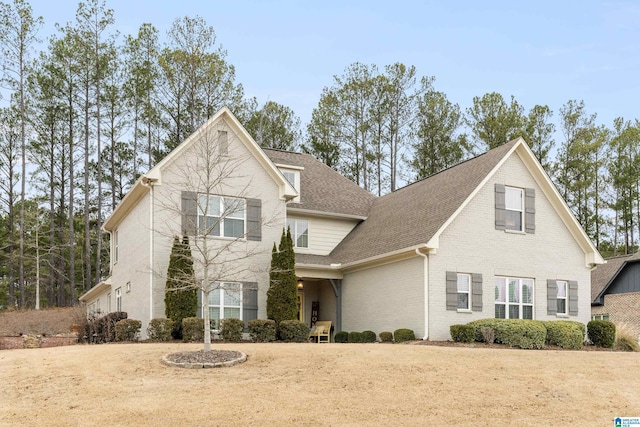 view of property with a front lawn