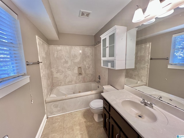 full bathroom featuring toilet, shower / bathing tub combination, and vanity