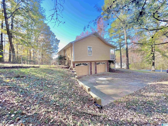 view of home's exterior featuring a garage