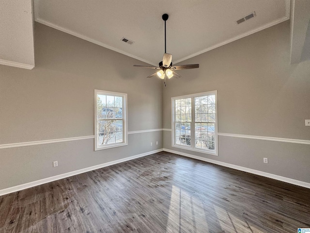 empty room with ornamental molding, dark hardwood / wood-style flooring, high vaulted ceiling, and ceiling fan