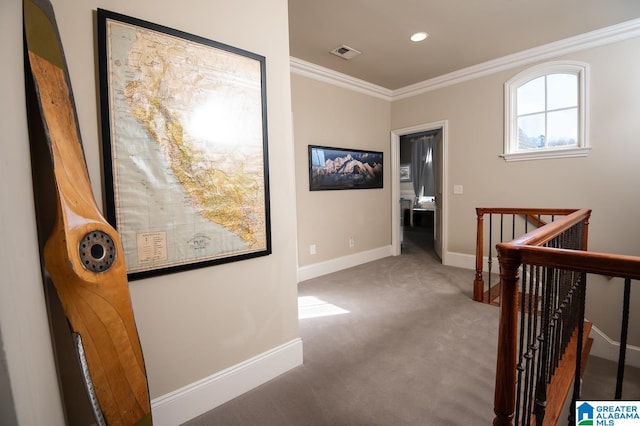 corridor with carpet flooring and crown molding