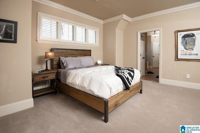 carpeted bedroom with ornamental molding