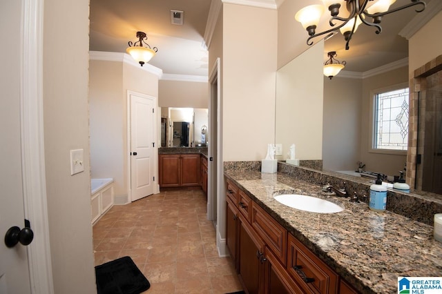 bathroom featuring a tub to relax in, vanity, a chandelier, and ornamental molding