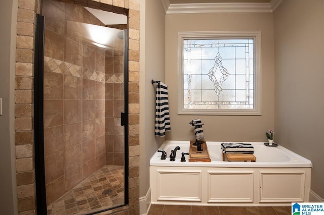 bathroom featuring crown molding and shower with separate bathtub