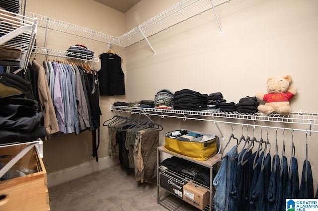 spacious closet featuring carpet floors