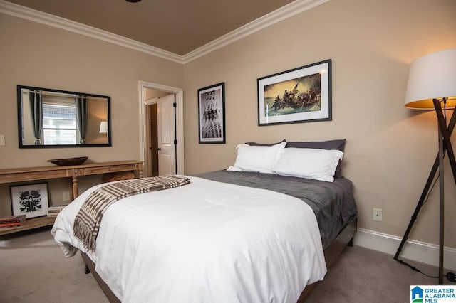 carpeted bedroom featuring crown molding