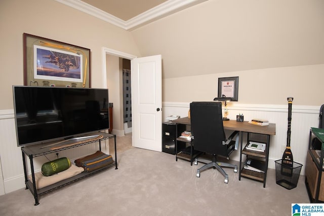 home office featuring light carpet, vaulted ceiling, and crown molding