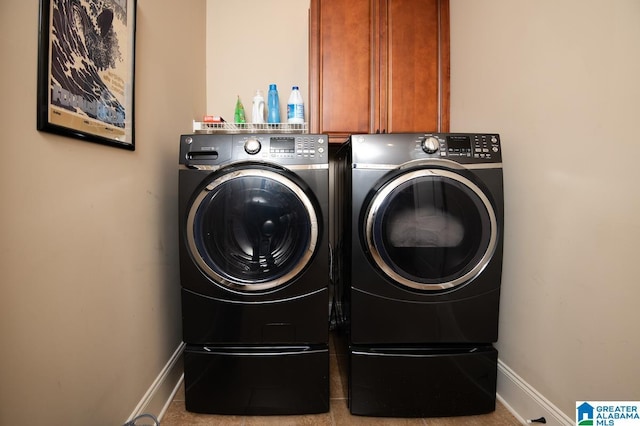 washroom with independent washer and dryer