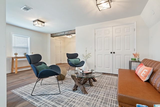 living area with wood-type flooring