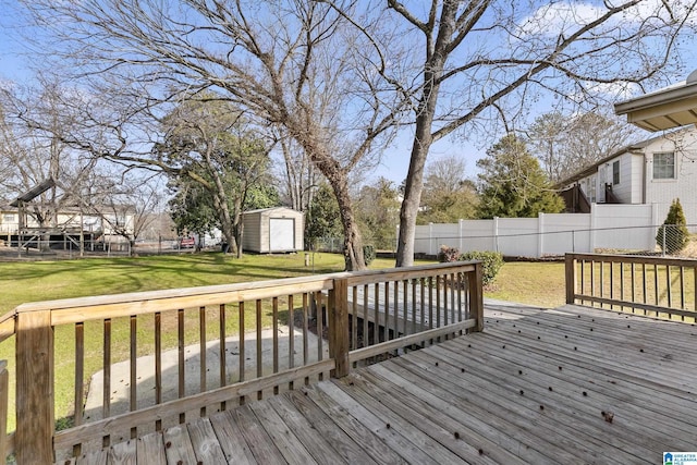 deck with a shed and a yard